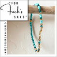 Load image into Gallery viewer, Beaded bracelet with turquoise and gold beads on a wooden stick, with text overlay.