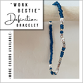 Load image into Gallery viewer, Beaded bracelet with blue and silver beads on a beige surface, labeled 'Work Bestie Definition Bracelet'.